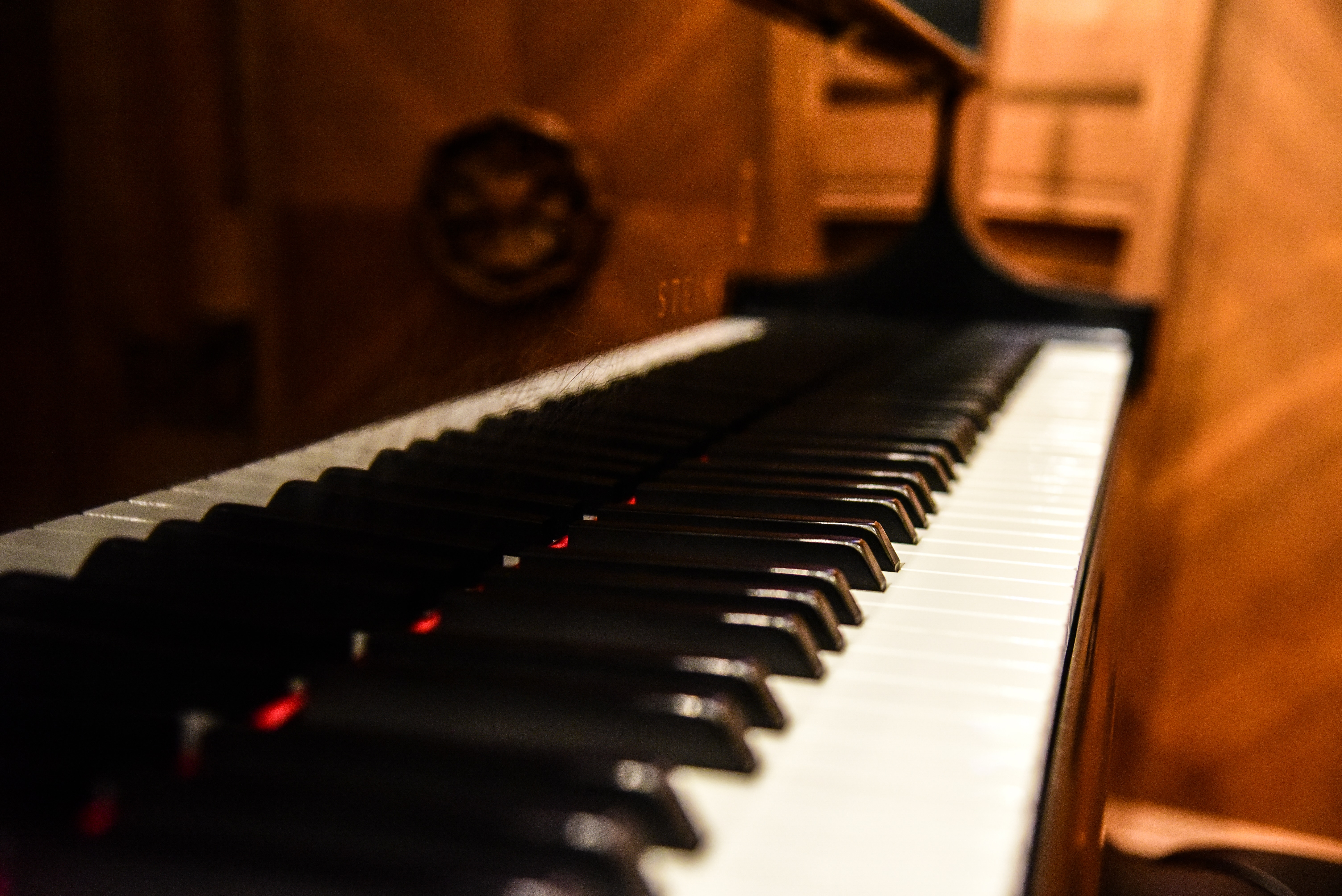 A Steinway piano keyboard, angled from the righthand side.